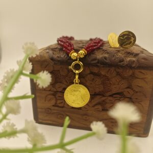 GINI TASSEL PENDENT