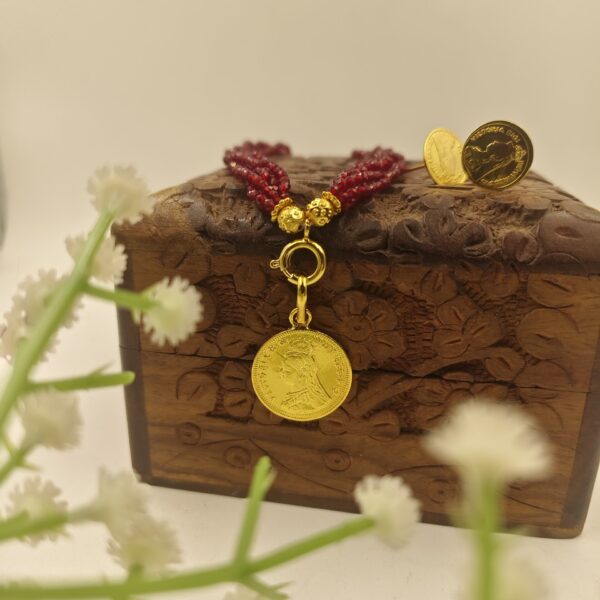 GINI TASSEL PENDENT